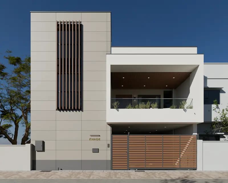White modern house front elevation in daylight